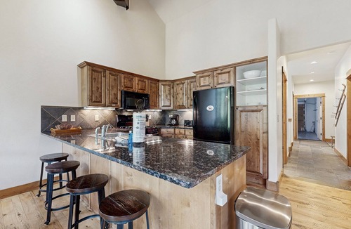 Big Sky House | Beautifully updated Big Sky chalet with hot tub, deck & free WiFi