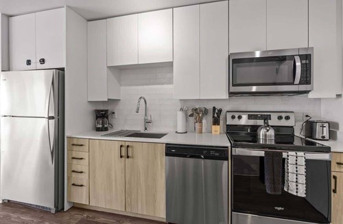 Evans Churchill Apartment | Boulevard Stays Modern Highrise STU Sky Pool, Gym 13