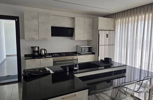 Suwailih Apartment | Charming 2-bedroom rooftop apartment with mountain view in Amman
