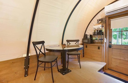 Strasburg RV Rental | Covered Wagon Camping w/Salt Water Hot Tub