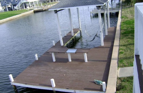 Crystal Beach Cabin | Pet-Friendly Vacation Rental with a Boat Slip on a Canal in Crystal Beach, Texas