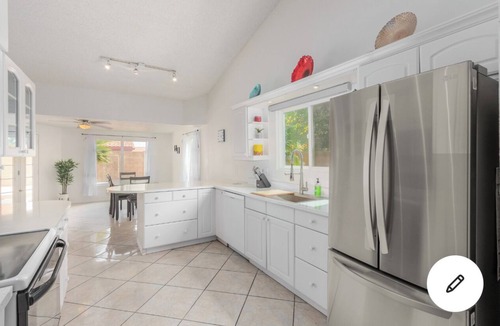 Val Vista Lakes House | The comfortable 3BR home is furnished with outdoor pool minutes away golf course
