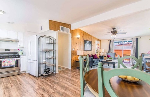 Midtown Apartment | This centrally located 3 bedroom 2 bathroom features a full size pool and electric vehicle charging on site.