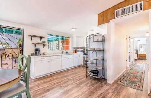 Midtown Apartment | This centrally located 3 bedroom 2 bathroom features a full size pool and electric vehicle charging on site.