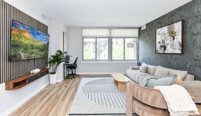 Sleek 2BR Residence with Gym, Parking & Rooftop Deck