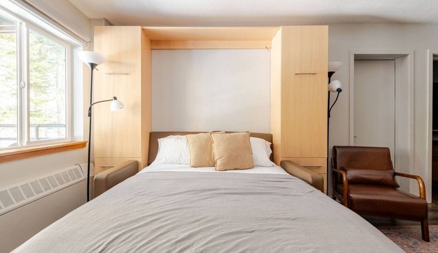 Super-Efficient Studio with Full Kitchen, Balcony & Smart Sleeping Options